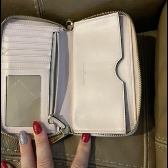 Michael Kors pink pebbles leather wristlet. - Picture 3 of 5